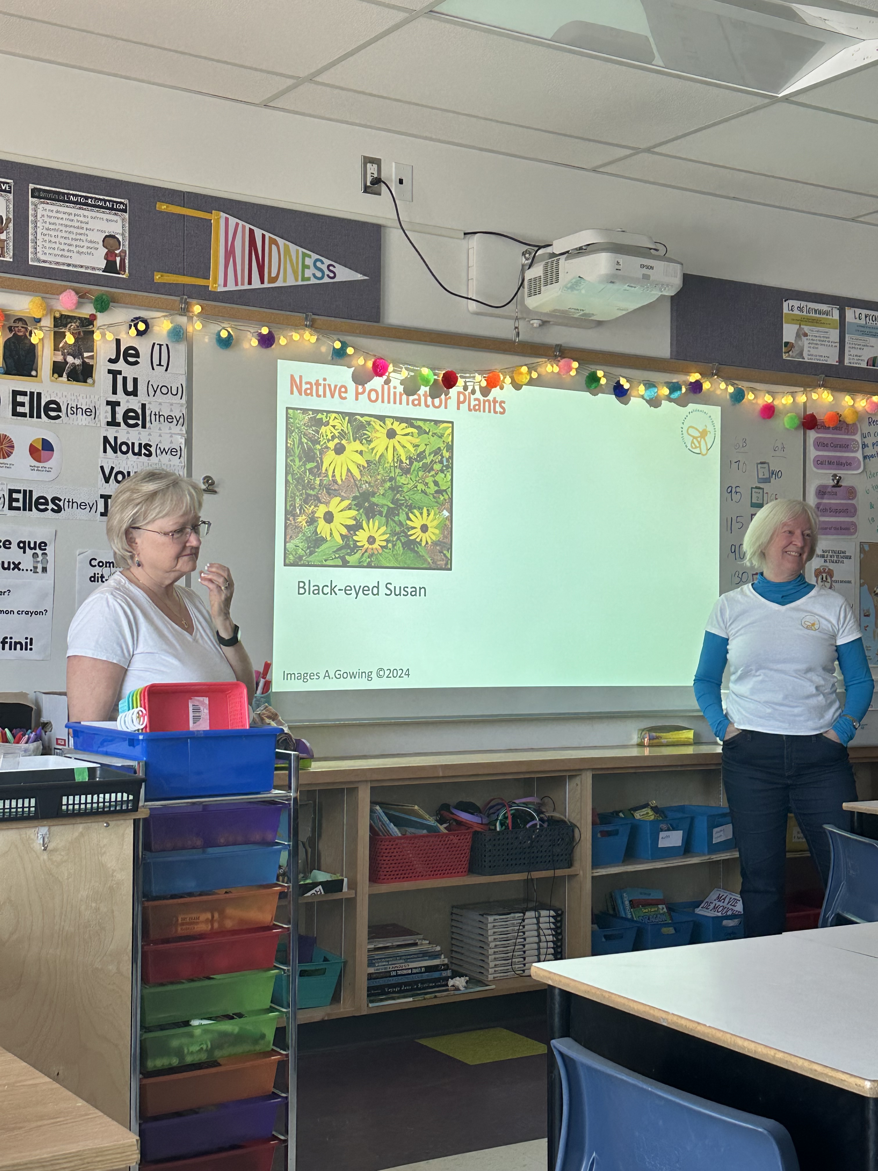 Pam and Andrea at Agincourt giving presentation.
