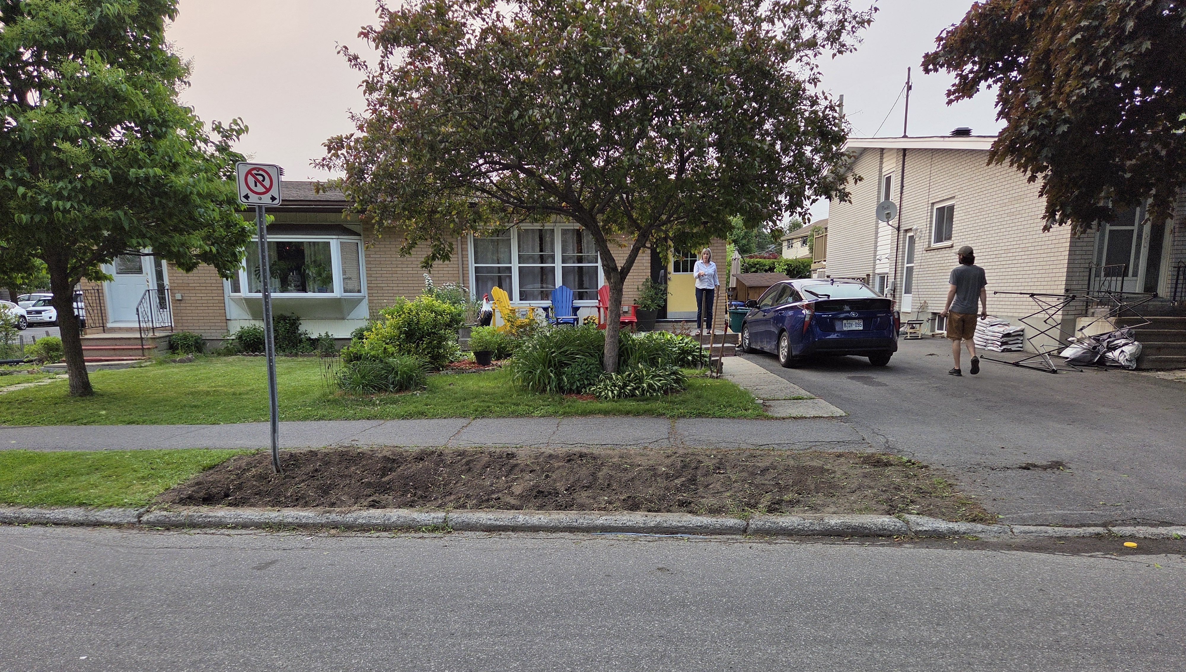 Front yard with boulevard not containing grass.